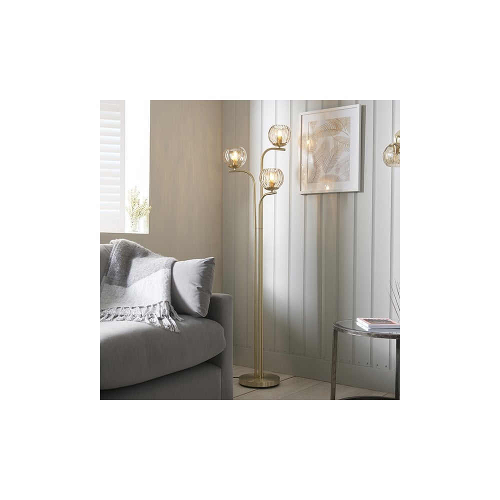 Dimple 3 Light Floor Lamp in Brushed Brass with Champagne Glass