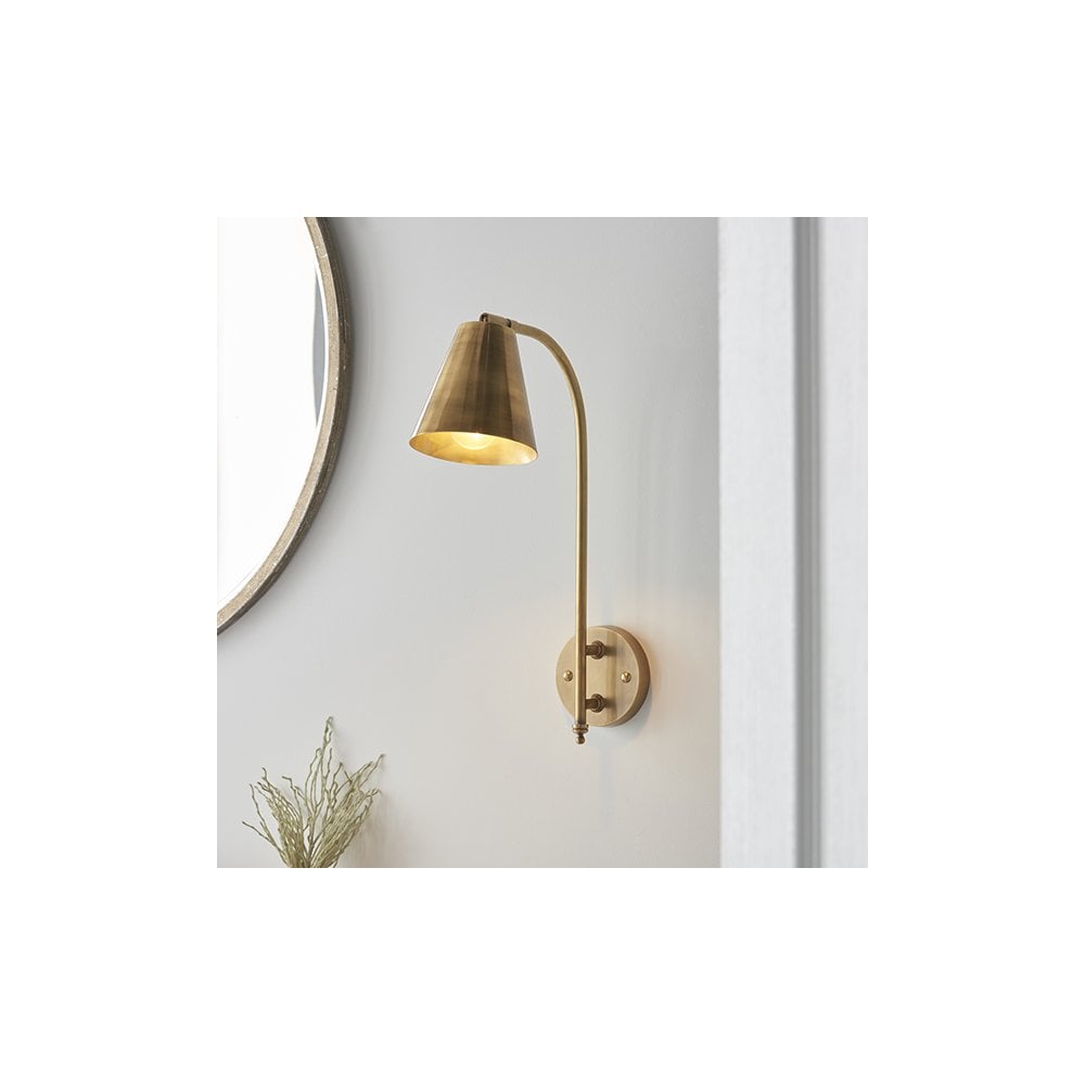 Radha Wall Light in Brass Finish