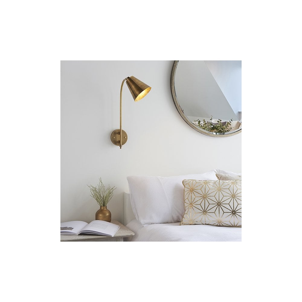 Radha Wall Light in Brass Finish