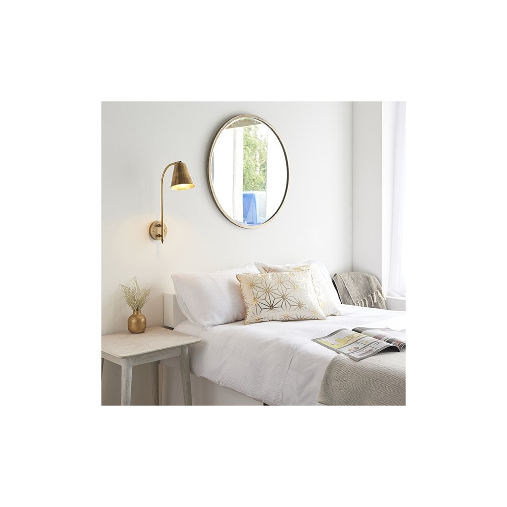 Radha Wall Light in Brass Finish