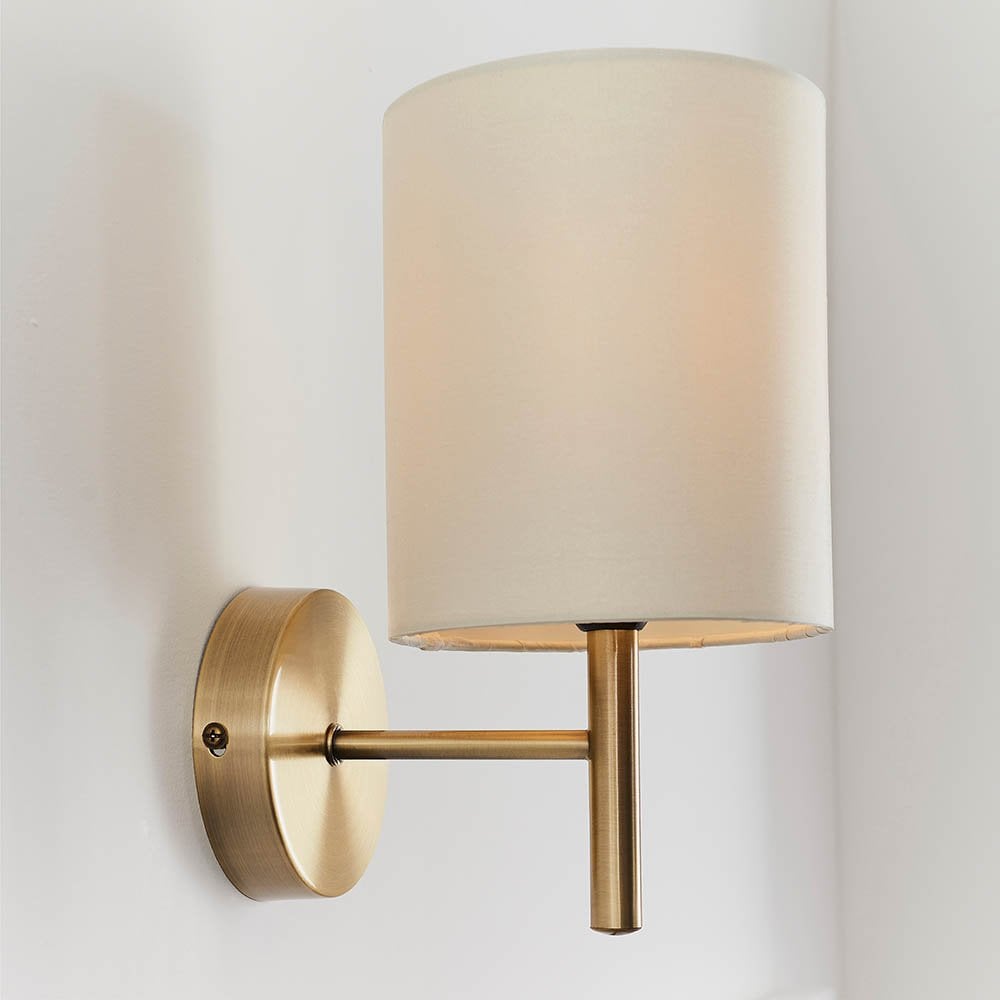 Brio Wall Light in Antique Brass C/W
