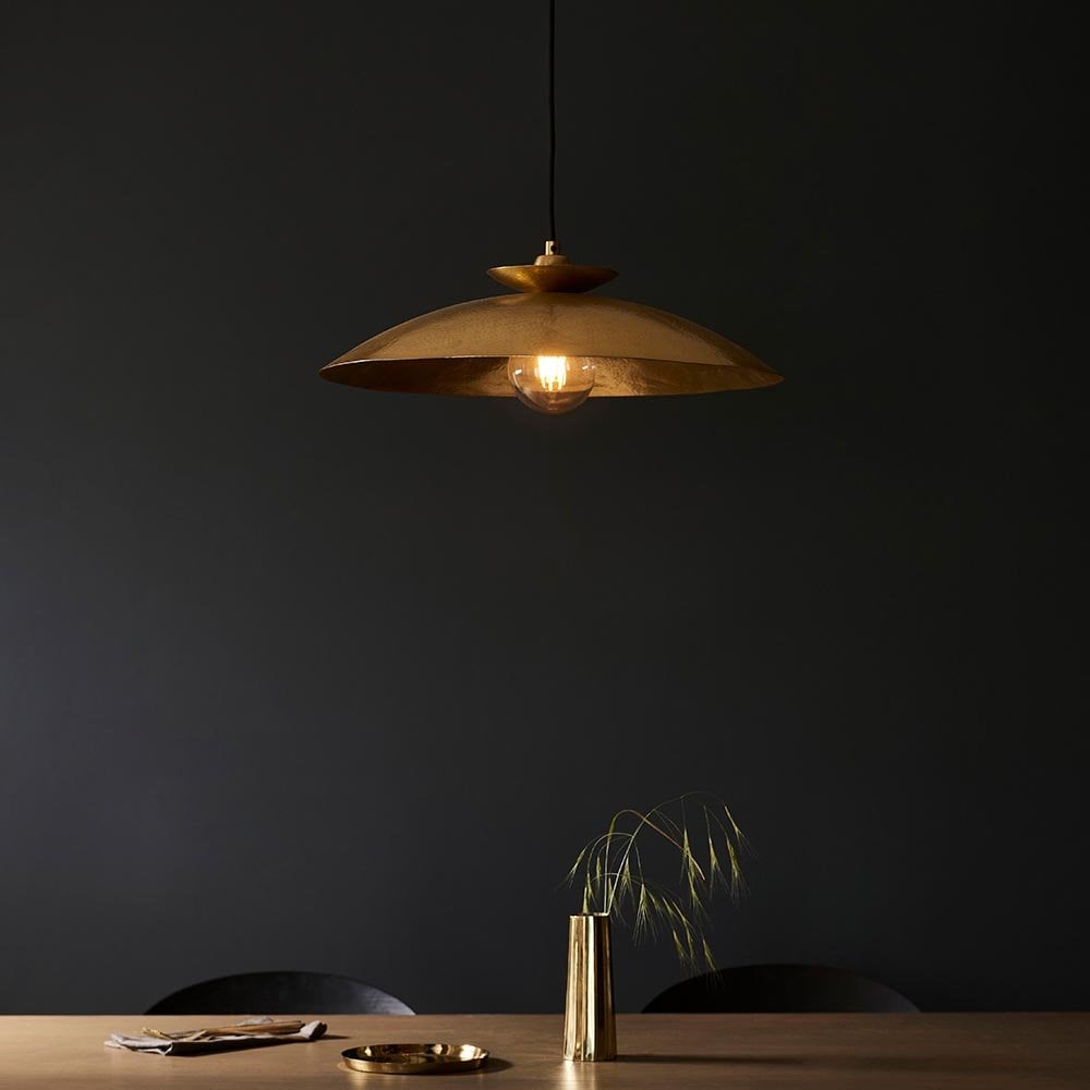 A Craft Hammered Pendant in Brass Finish