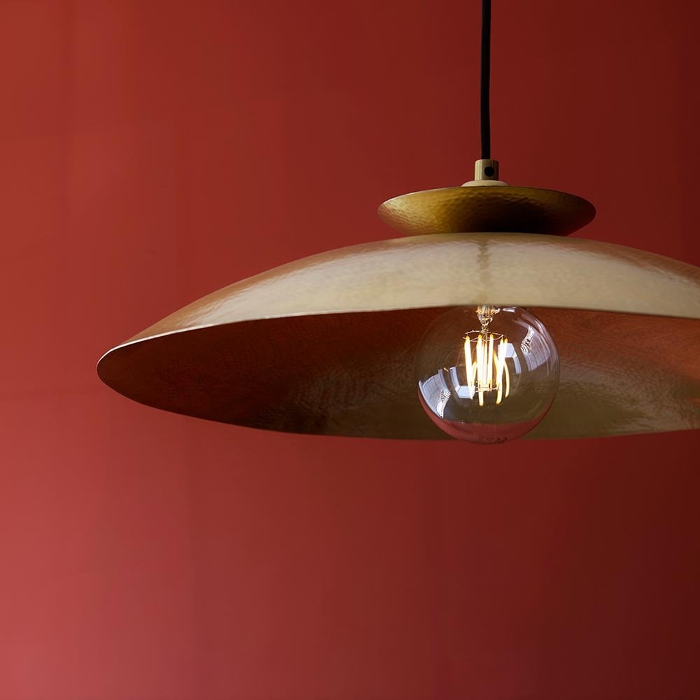 A Craft Hammered Pendant in Brass Finish
