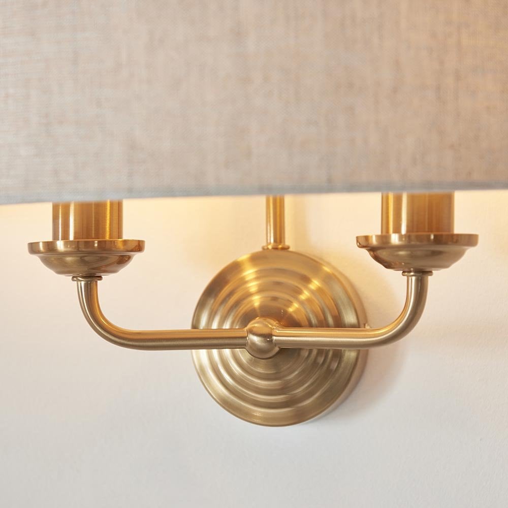 Highclere Double Wall Light in Brass C/W Natural Shade