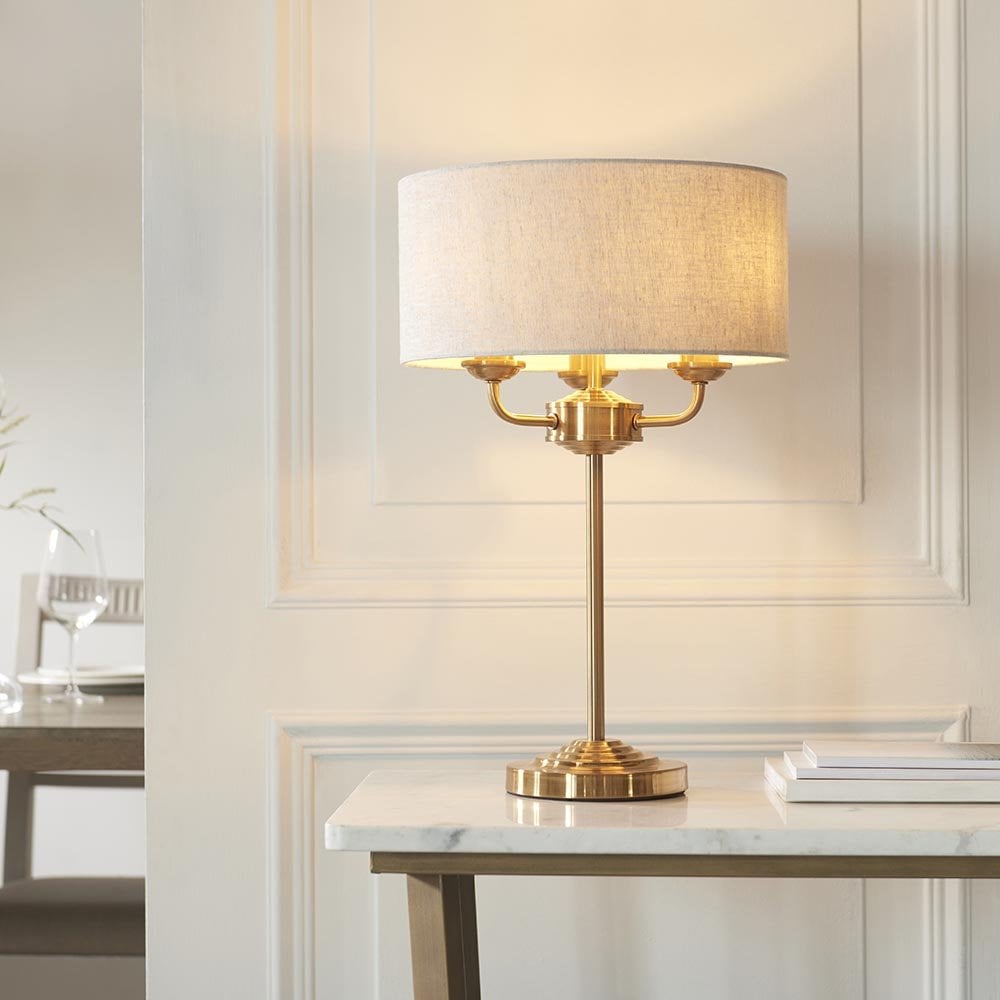Highclere 3 Light Table Lamp in Brass C/W Natural Shade