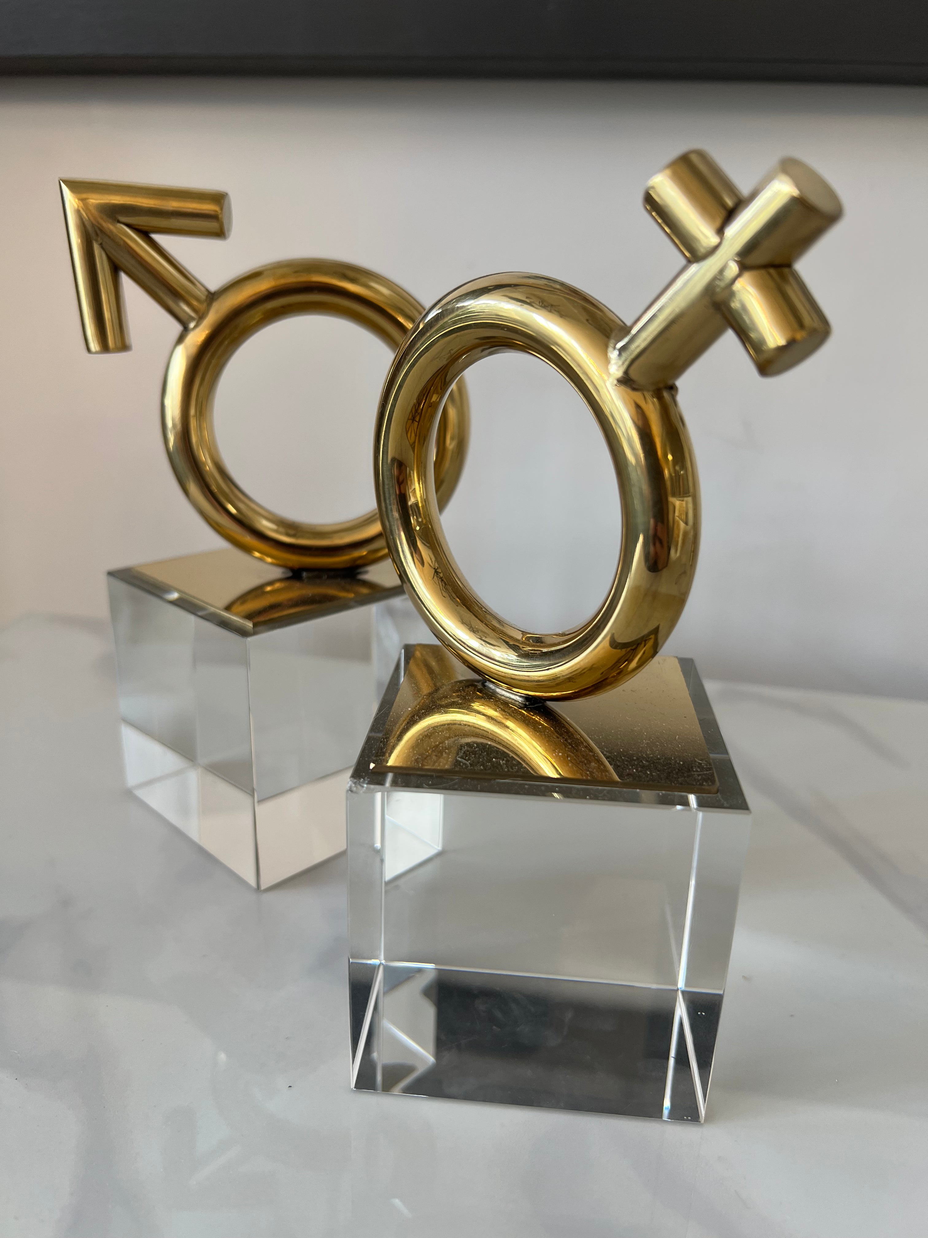 Set of 2 Gold Sculptures on Glass Base