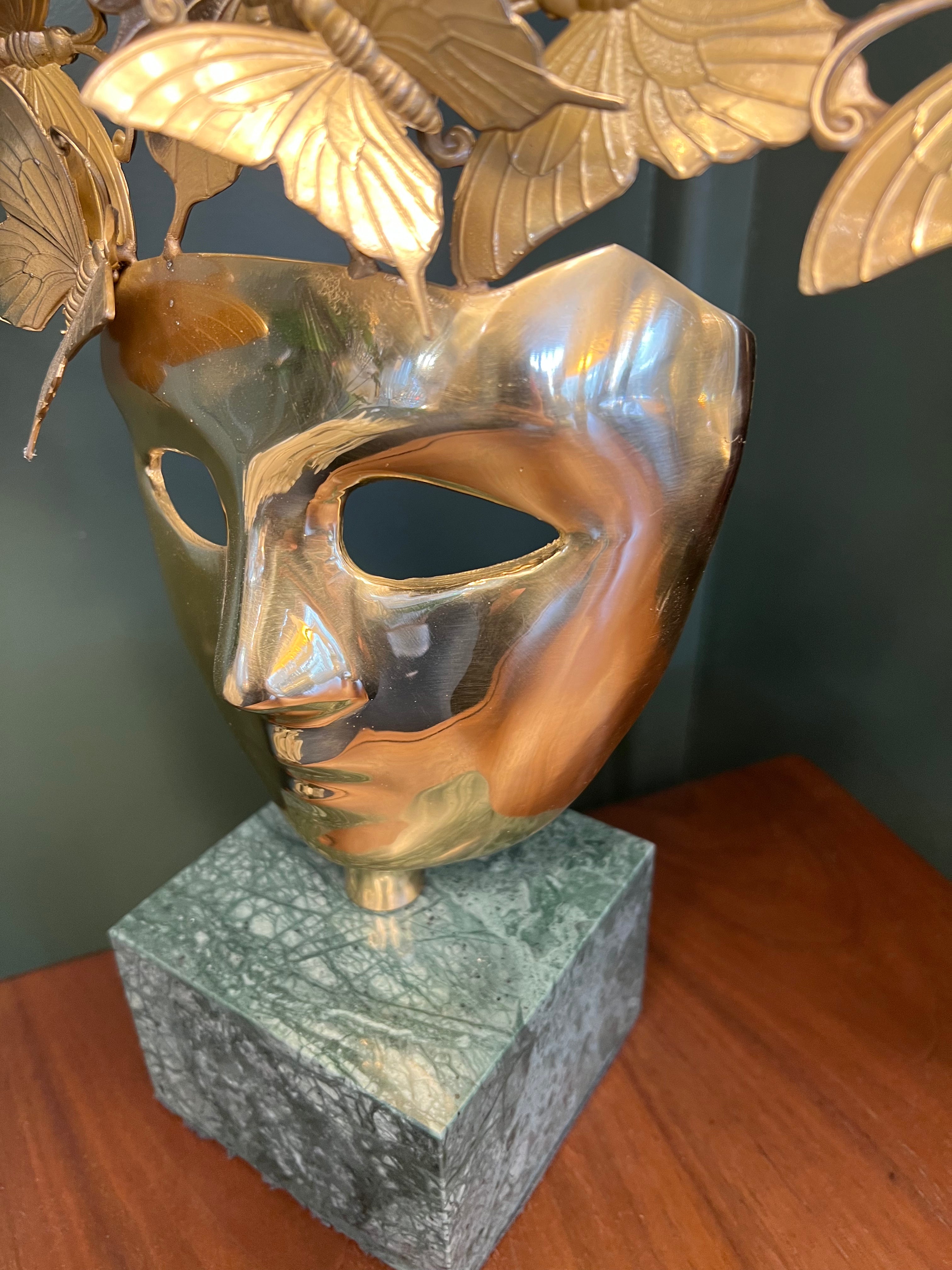 Butterfly Mask Sculpture on Stone Base