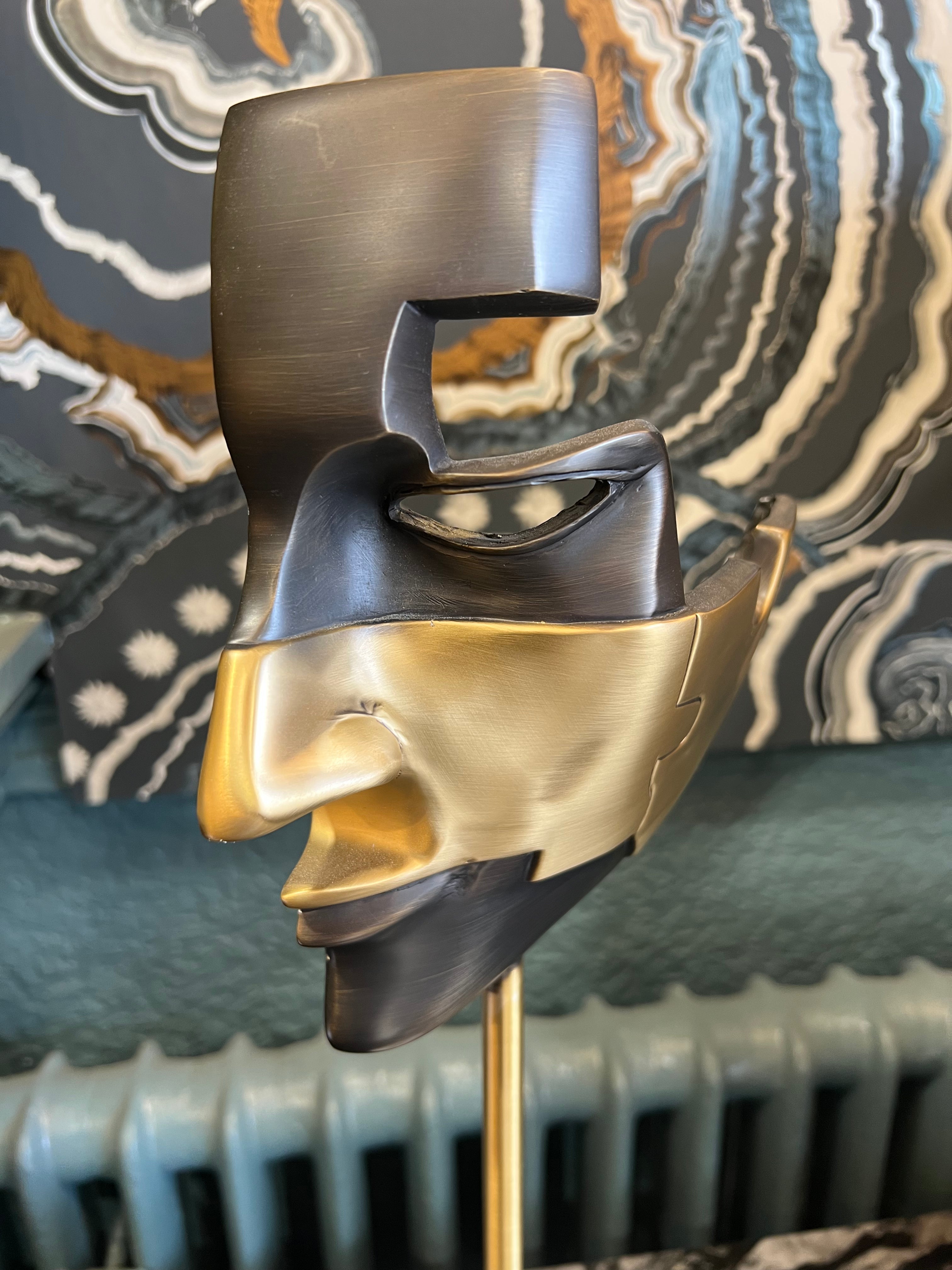 Small Black and Gold Mask on Stone Base