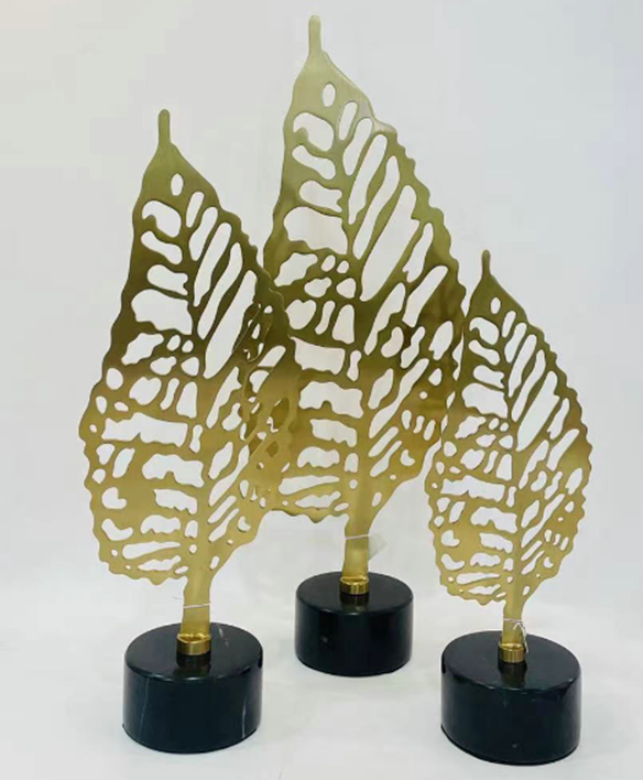 Large Gold Leaf on Black Stone Base