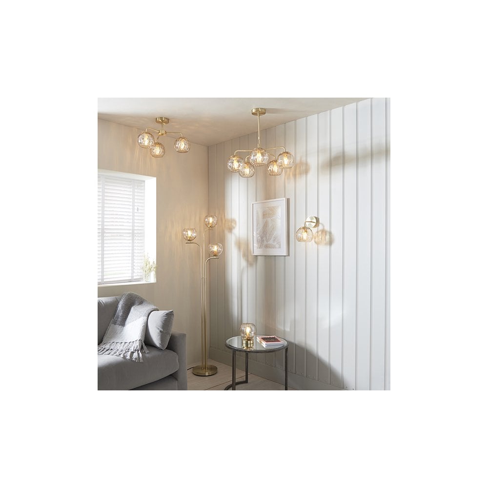 Dimple Wall Light in Brushed Brass with Champagne Glass