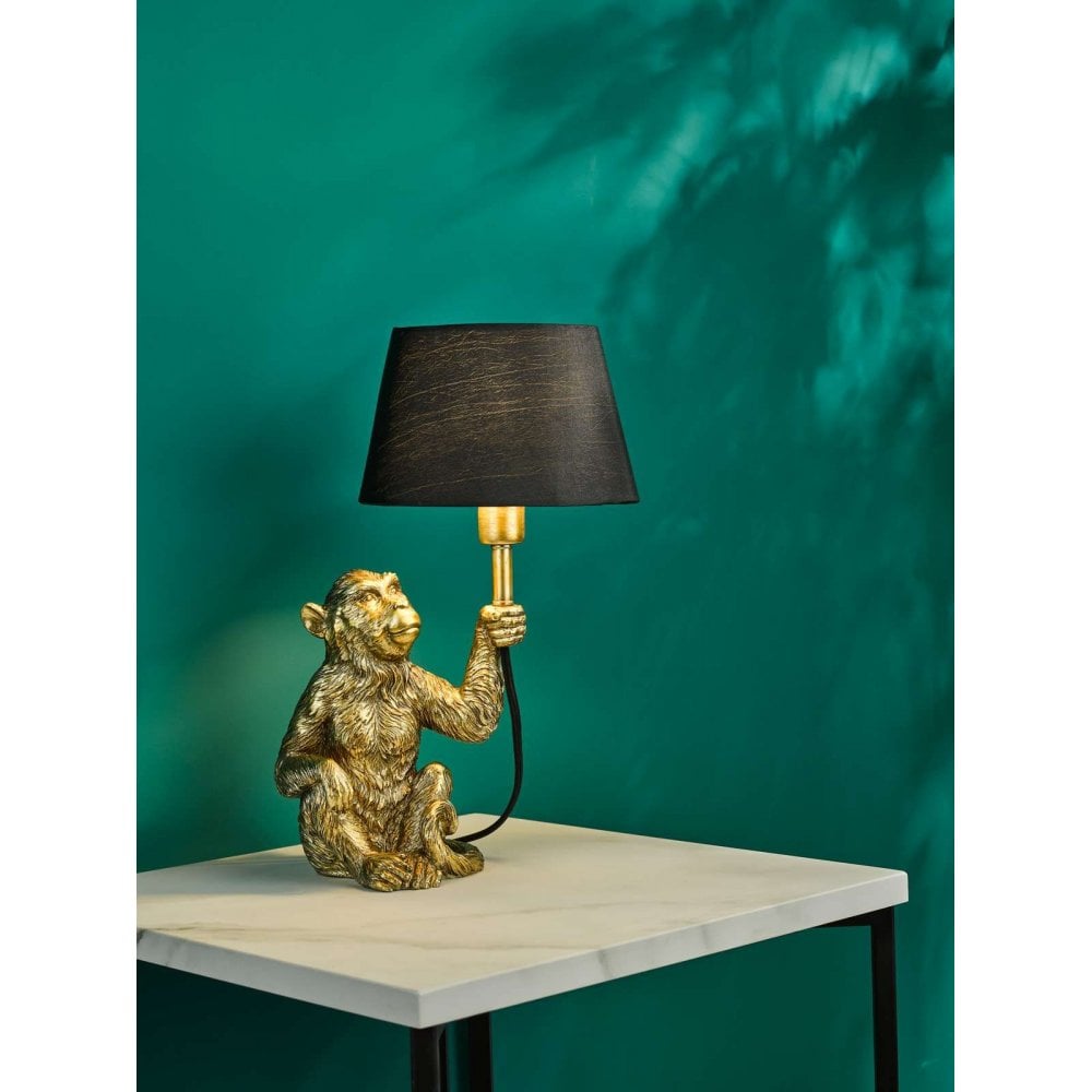 Zira Gold Monkey Table Lamp C/W Black Shade