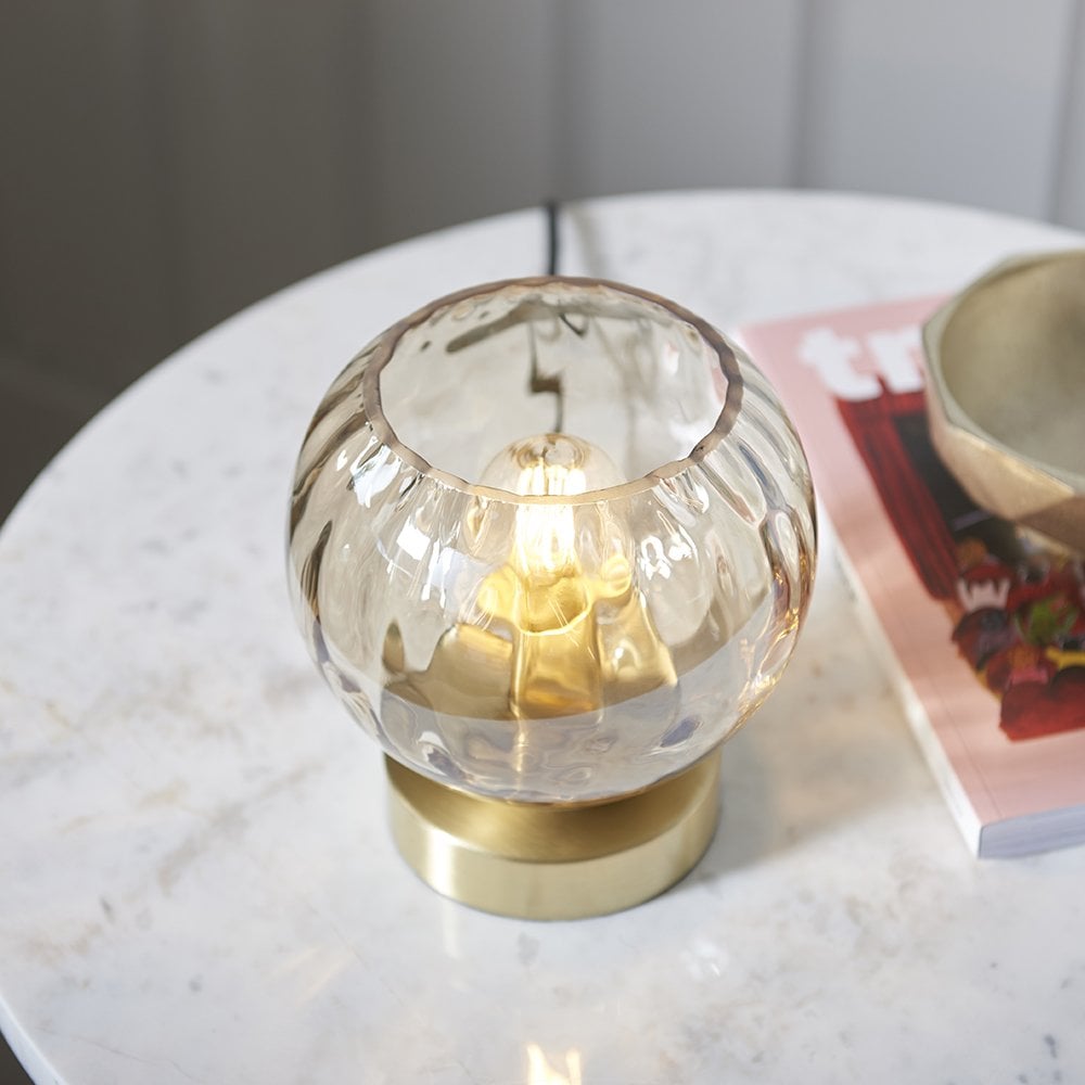 Dimple Table Lamp in Brushed Brass with Champagne Glass