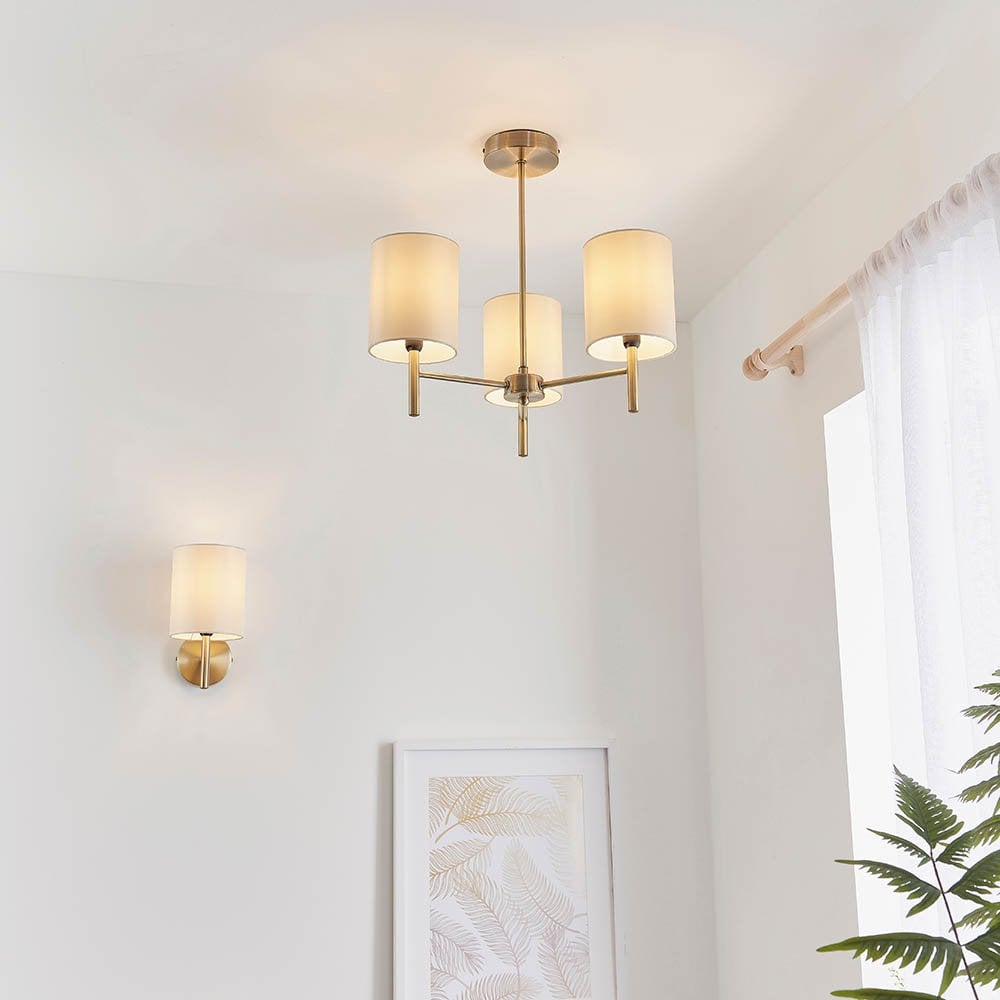 Brio Wall Light in Antique Brass C/W
