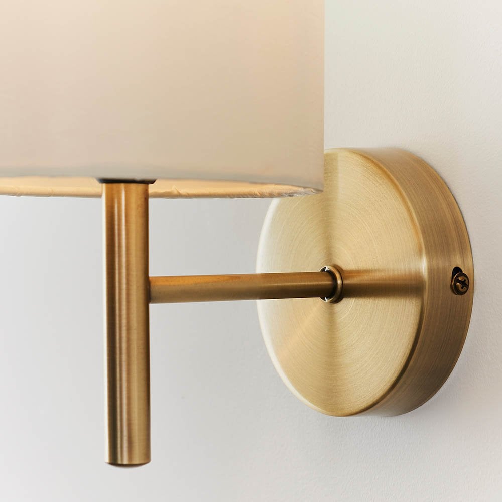 Brio Wall Light in Antique Brass C/W