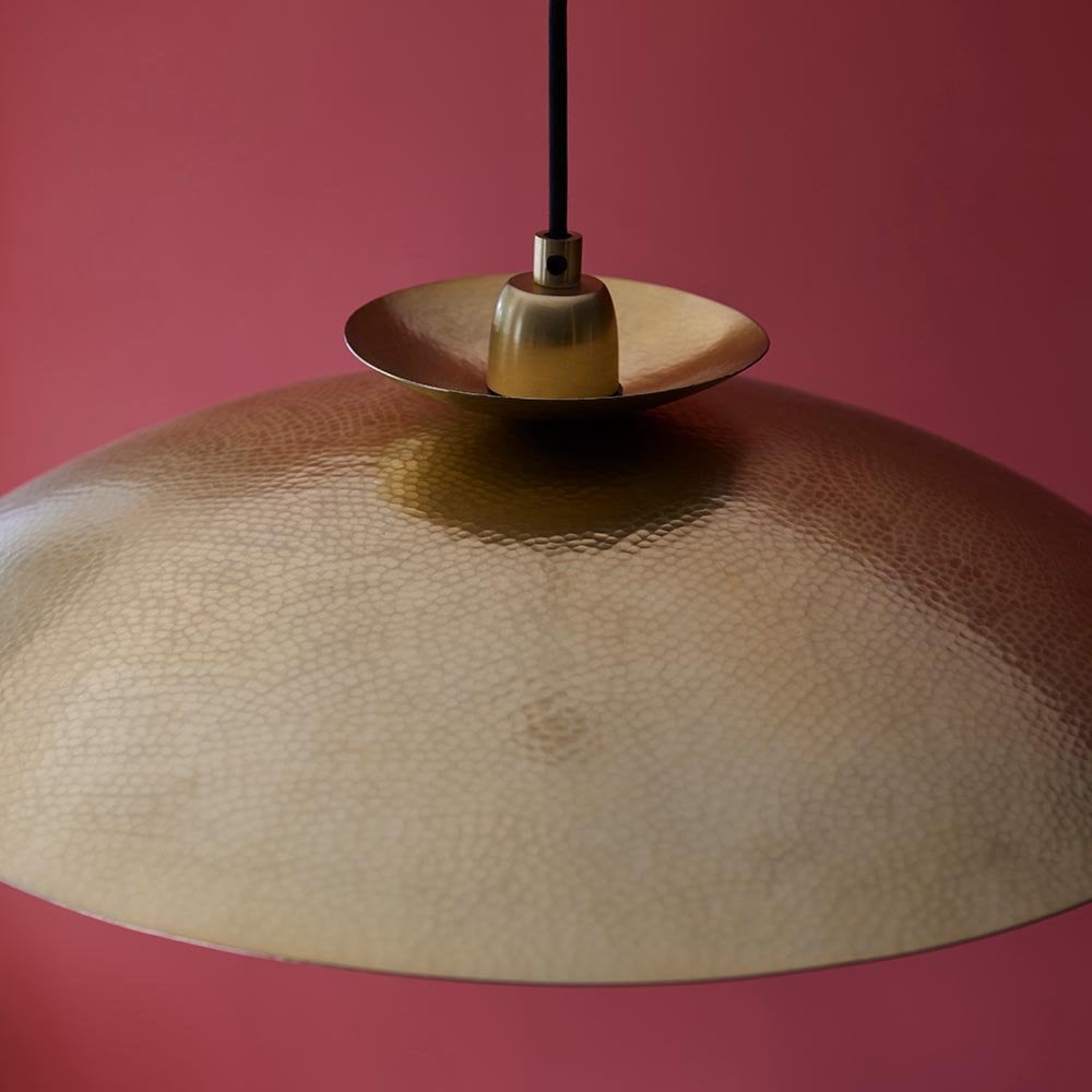A Craft Hammered Pendant in Brass Finish
