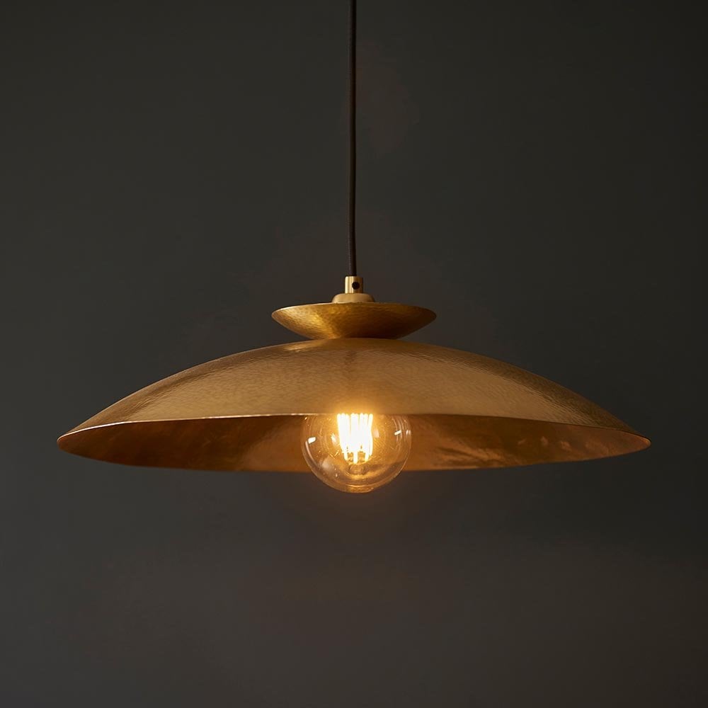 A Craft Hammered Pendant in Brass Finish