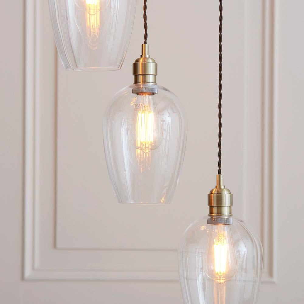 Millie Antique Brass 7 Light Pendant with Clear Glass Shades