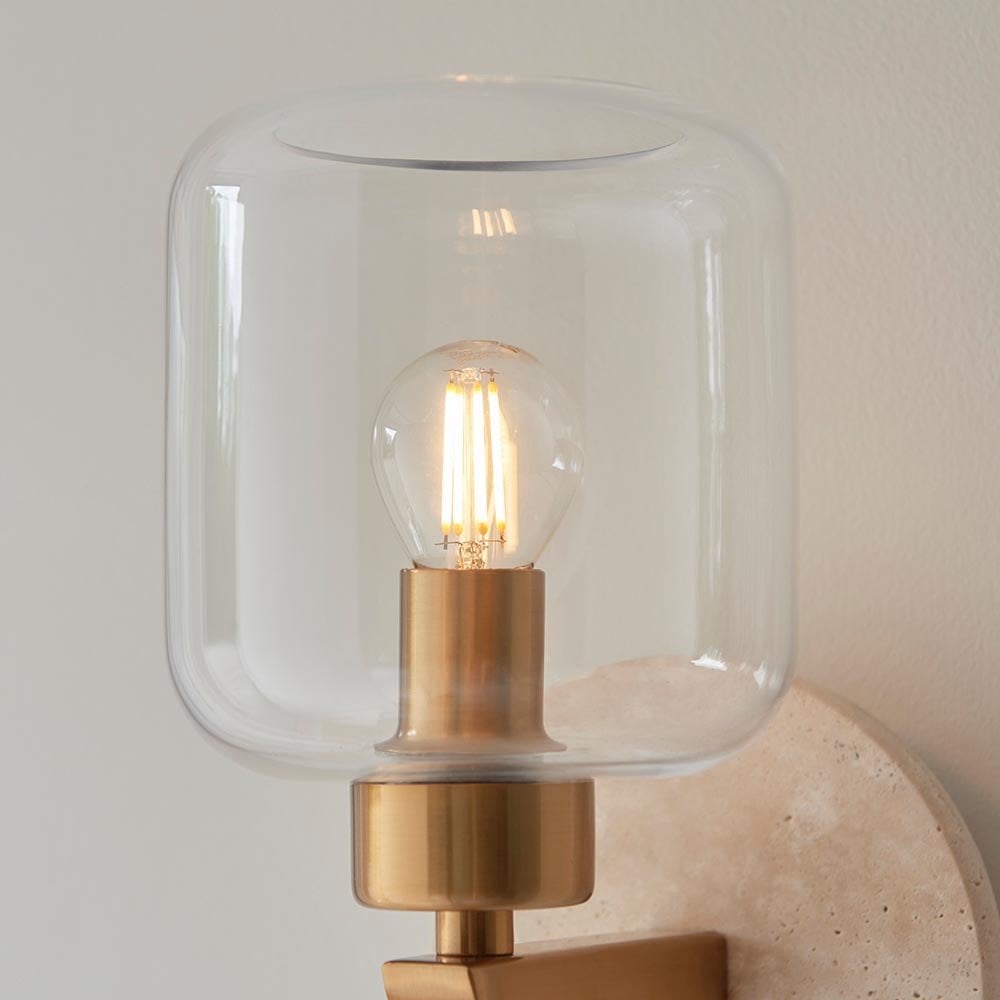Travi Natural Travertime Stone Wall Light C/W Clear Glass Shade