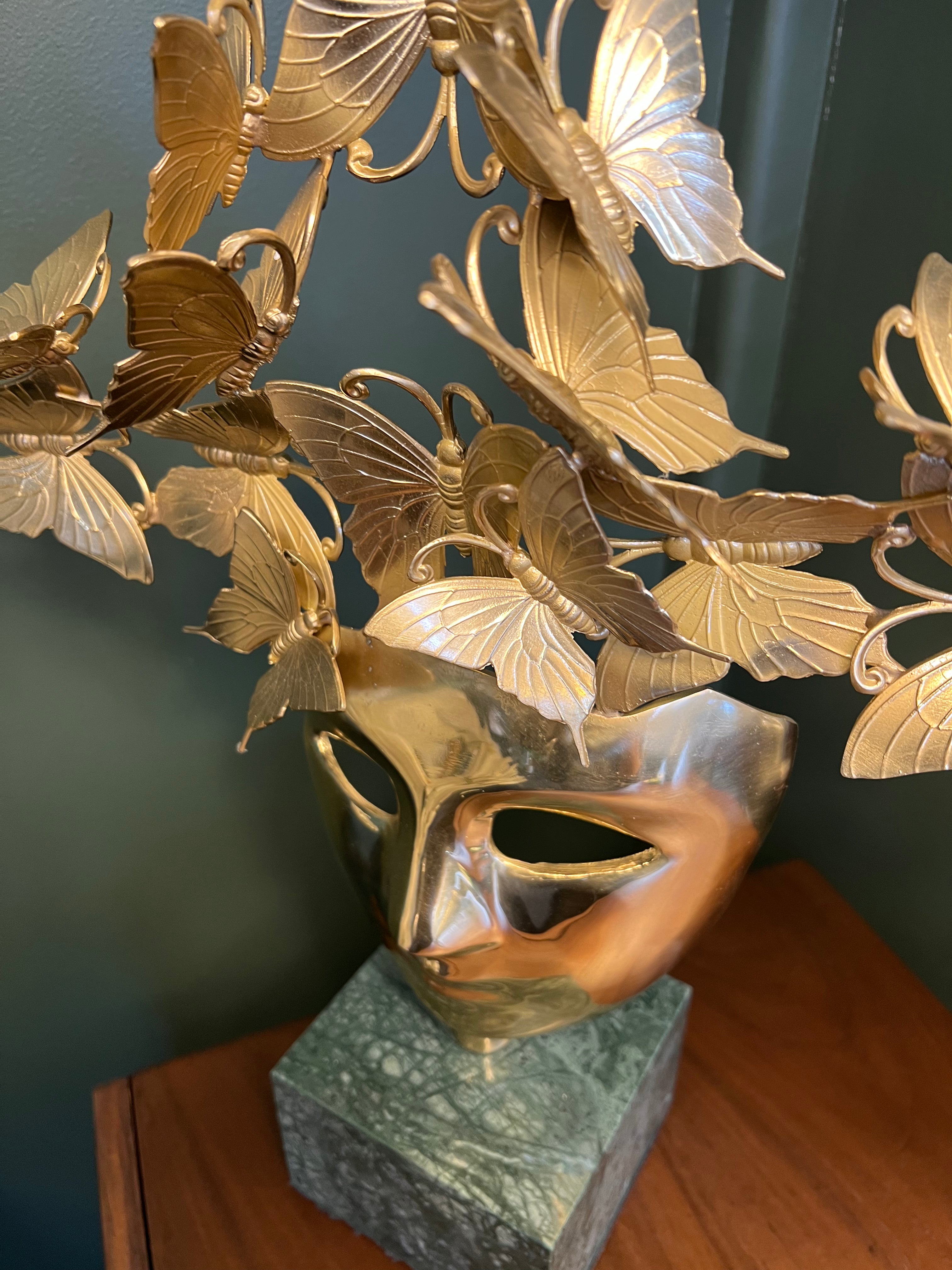 Butterfly Mask Sculpture on Stone Base