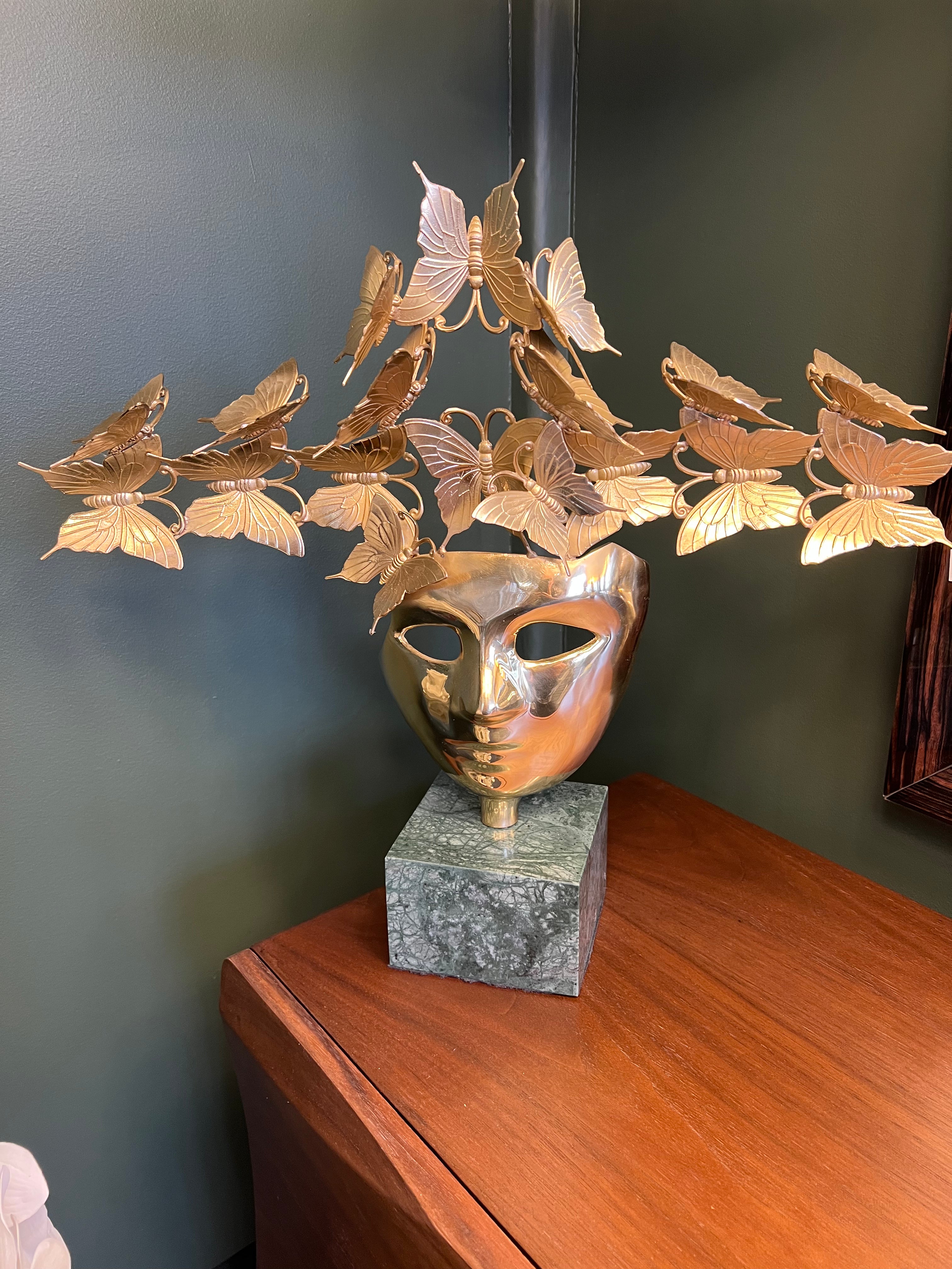 Butterfly Mask Sculpture on Stone Base