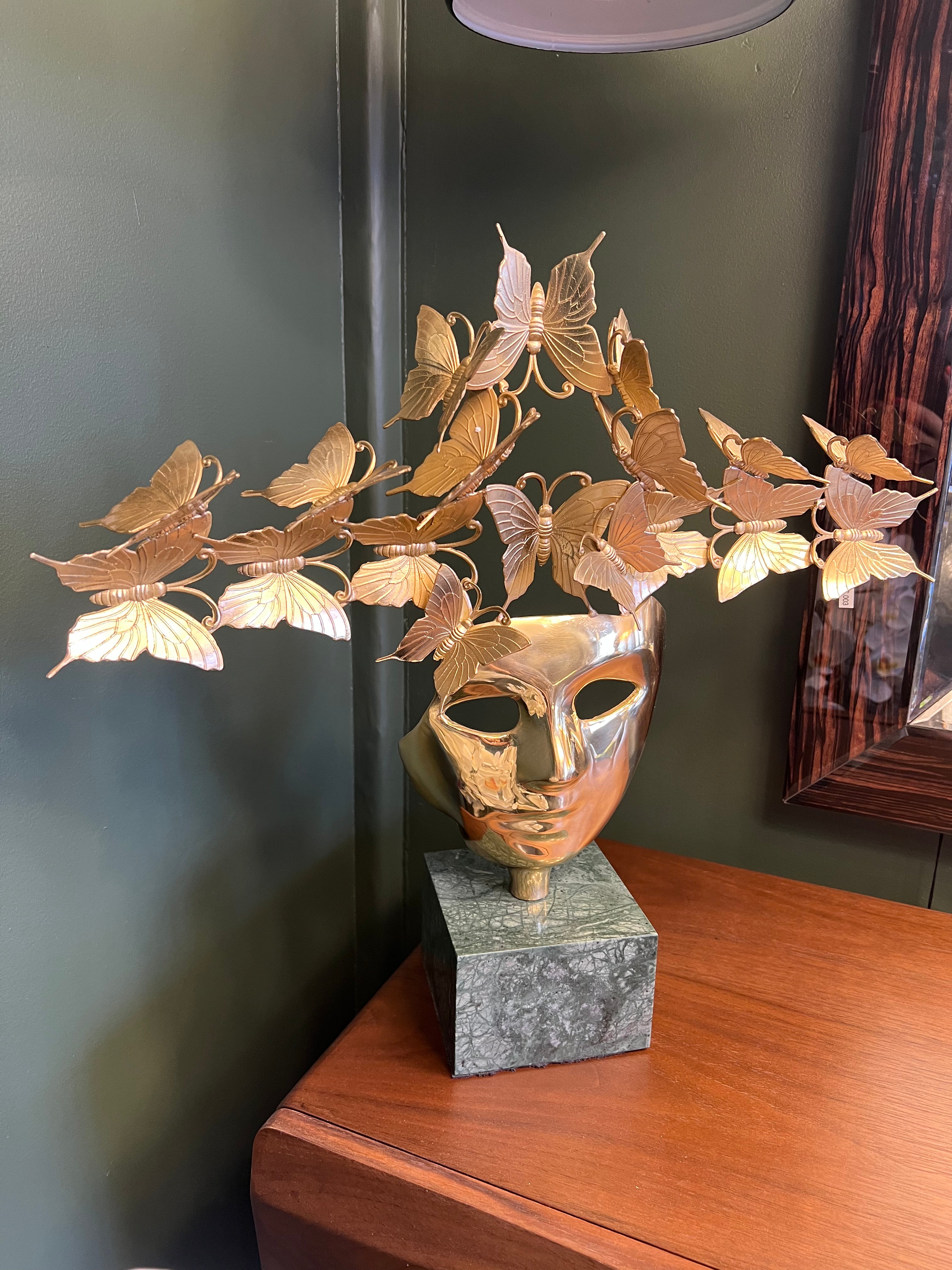 Butterfly Mask Sculpture on Stone Base