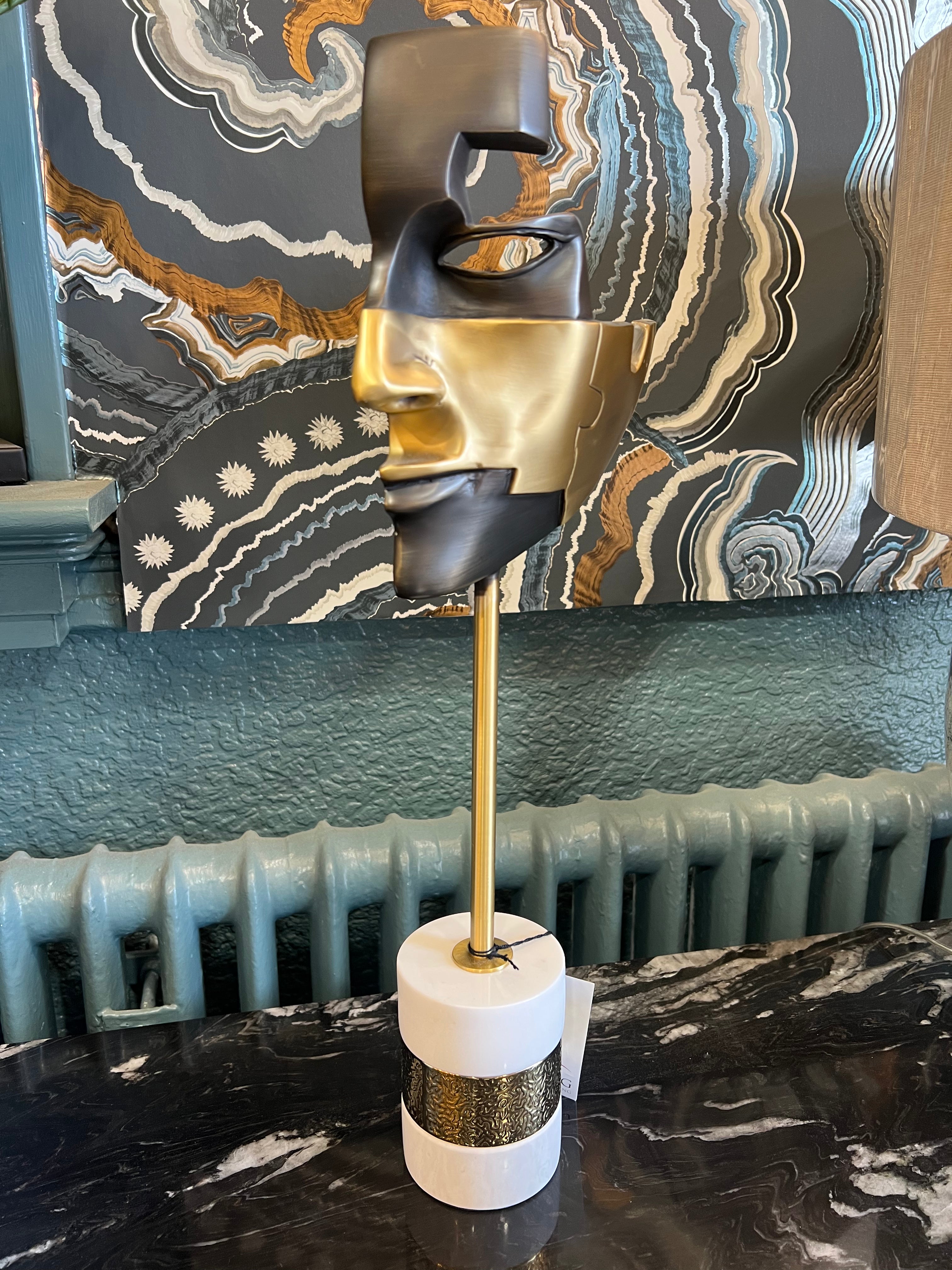 Small Black and Gold Mask on Stone Base