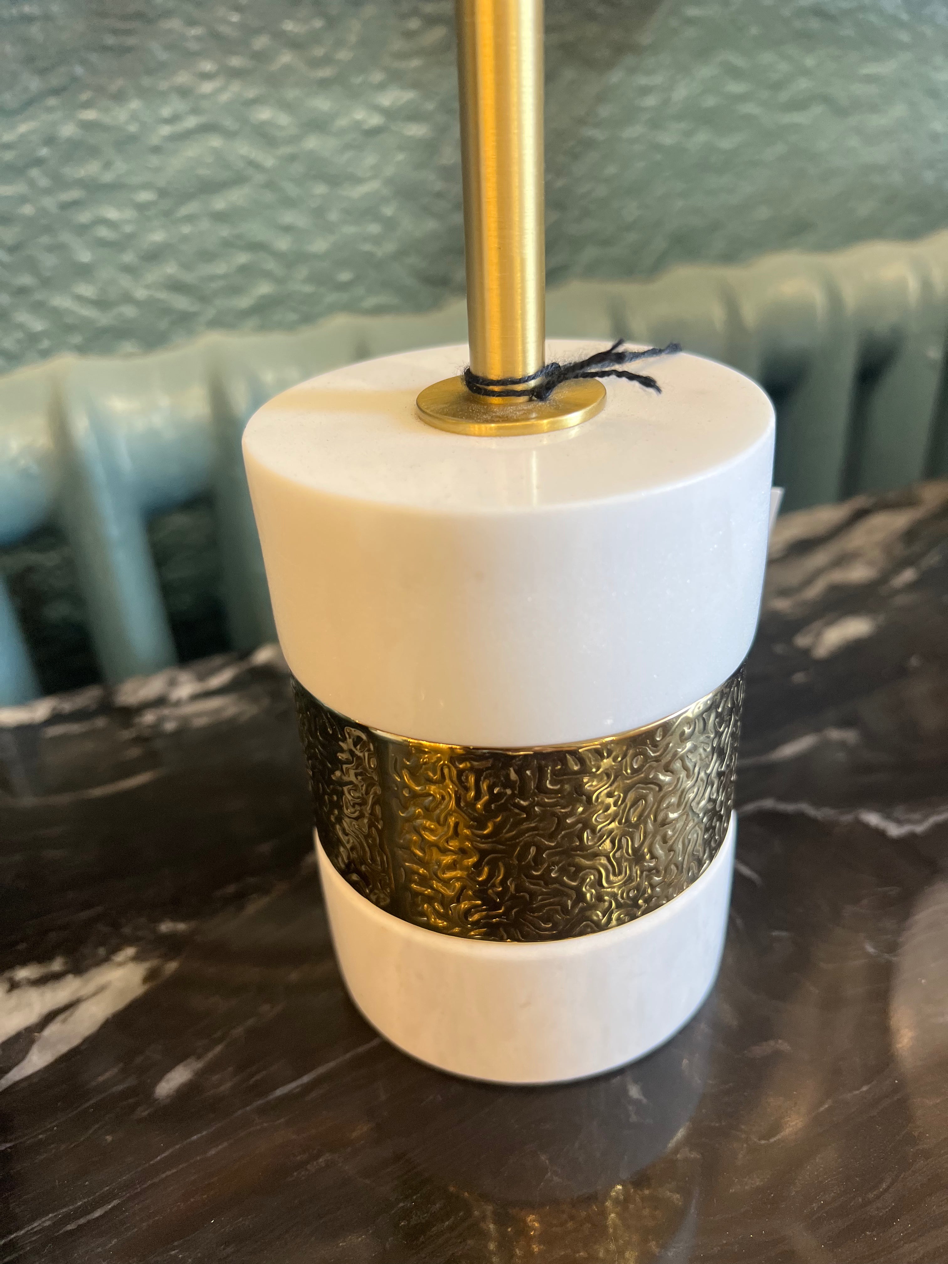 Small Black and Gold Mask on Stone Base
