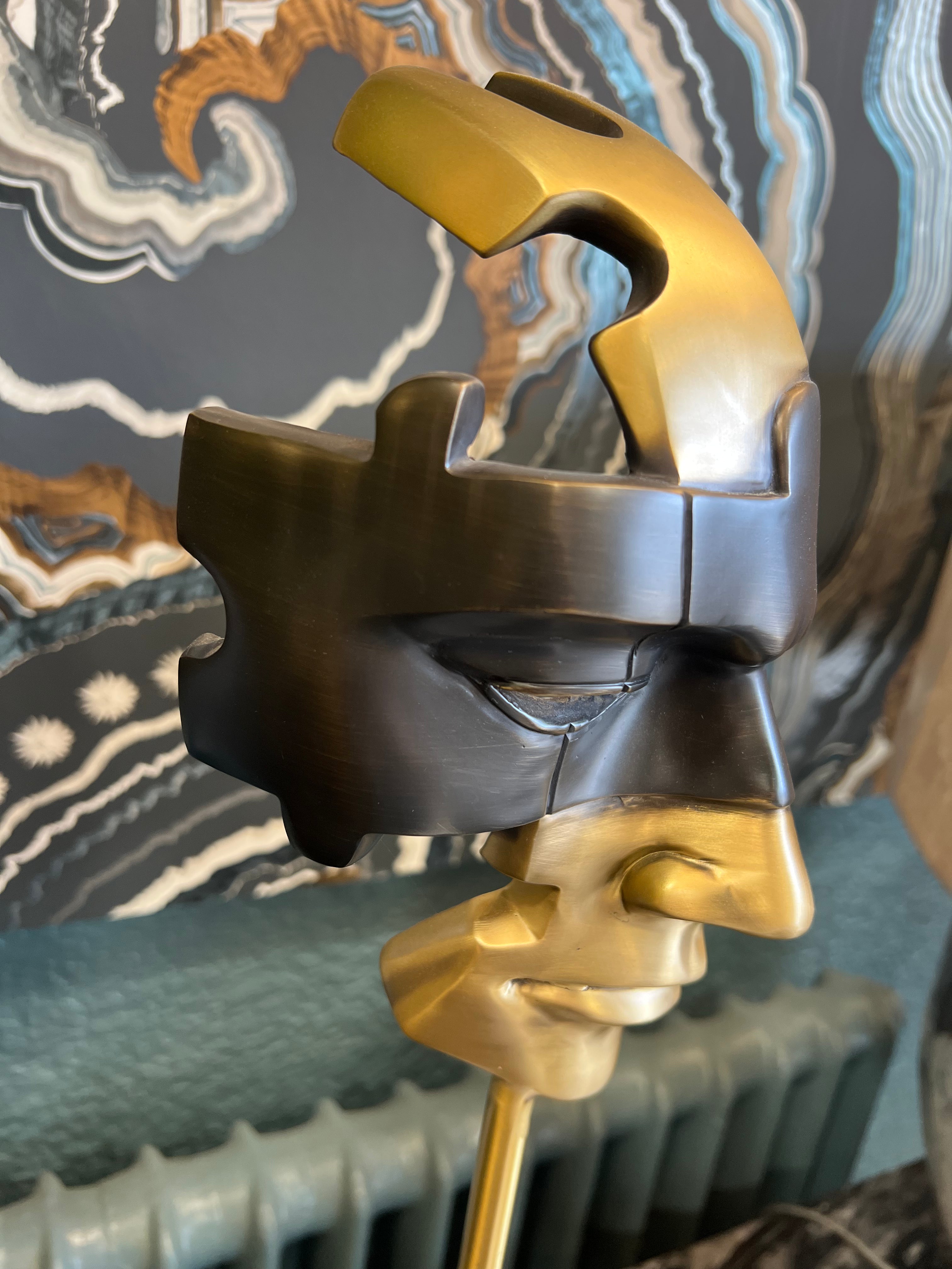 Large Black and Gold Mask on Stone Base